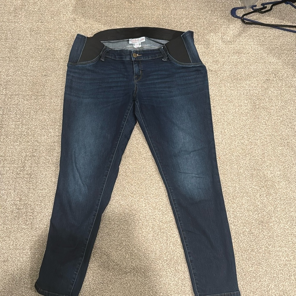Maternity blue jeans with side stretched.